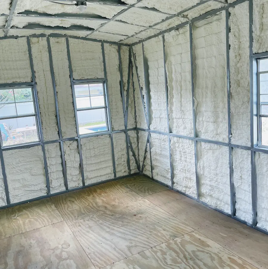 Closed-cell spray foam insulation applied to wall cavities in a residential project in Boston